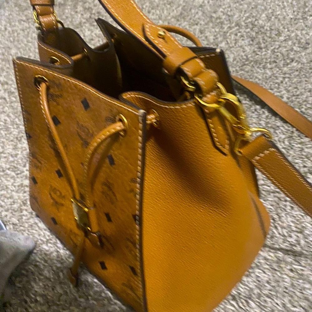 MCM bag inside has pen marks good shape